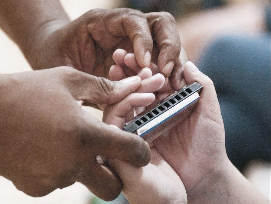 A Beginner's Guide to How to Play Harmonica - Bestazy Tips